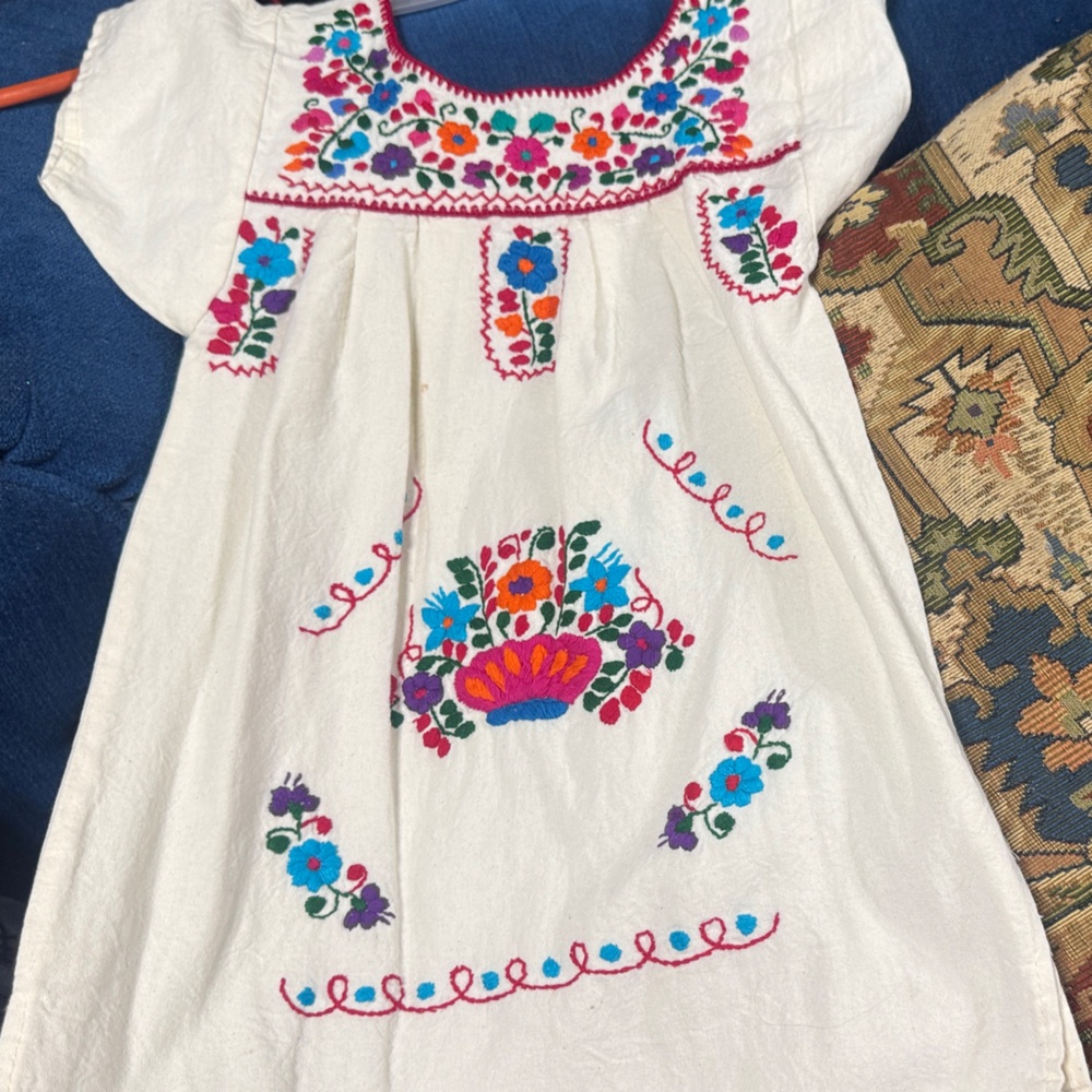 Embroidered White Dress with Colorful Floral Patterns